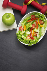 Healthy fitness meal with fresh salad. Diet concept.