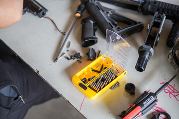 Equipment technician on wood table