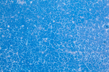 Blue background with cement dust
