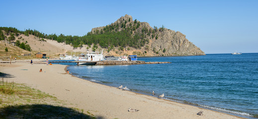 Fototapeta na wymiar Panorama of the bay Peschanaya on Lake Baikal, August 16, 2007