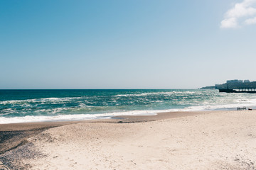 View of an empty beach on a sunny day