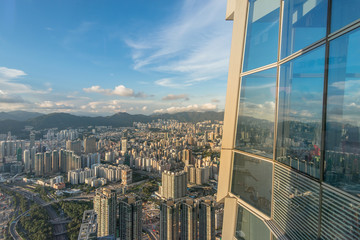 Fototapeta na wymiar City at Sunset - View from Sky100, ICC Tower, Victoria Harbour, Hong Kong