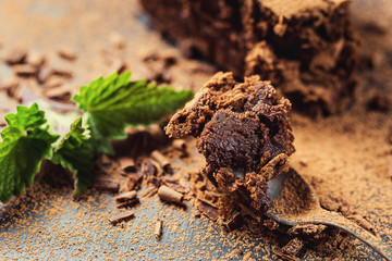chocolate cake with Candies,Chocolate cake with a cut piece and blade on gray background, closeup,Dark chocolate cake,Delicious vegan chocolate cake,Tasty chocolate cake on wooden background