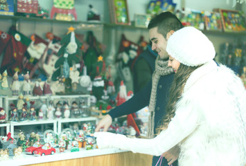 Fototapeta na wymiar Couple at Christmas market