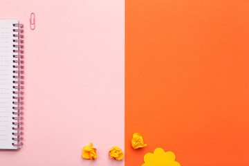 School or Office Accessories on Pink and Orange Background