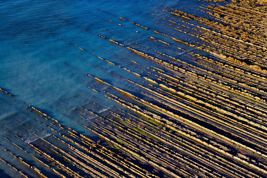 rocky coast in Zumaia with flysches