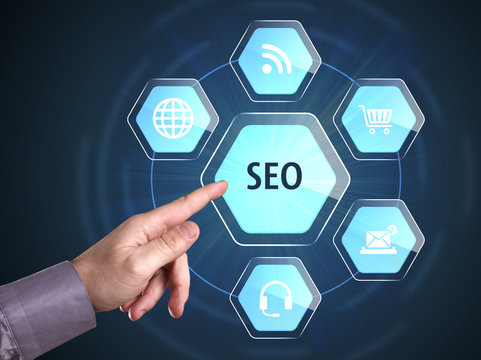 Business, Technology, Internet and network concept. Young businessman shows the word: SEO