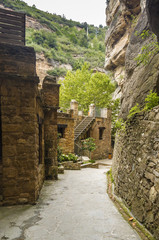 Cloudy view of monastery complex Sant Miquel del Fai not far from Barcelona, Catalonia, Spain.