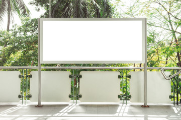 Blank white billboard for advertisement on street.
