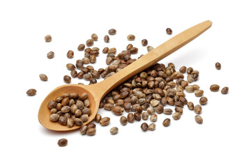 Hemp seeds with wooden spoon