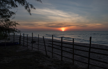 Naklejka na ściany i meble Sunrise in the morning along the beach