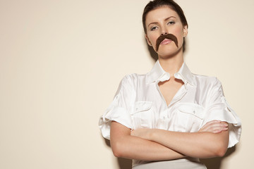 Portrait of woman wearing moustache
