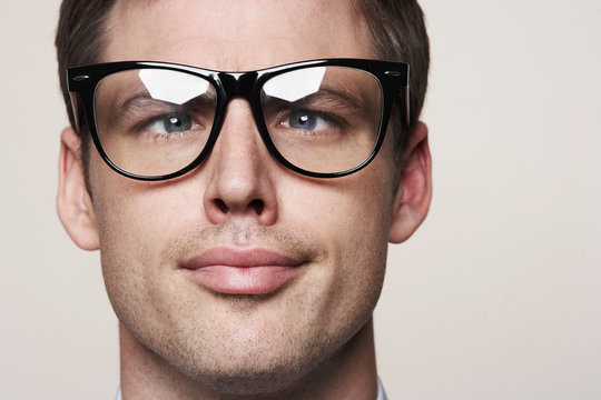 Young man wearing retro glasses