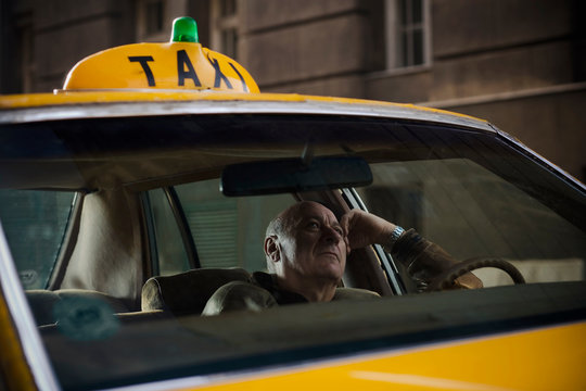 Taxi driver Waiting for fare in a taxi