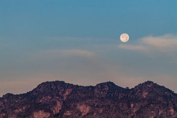Moon in the morning over the mountain