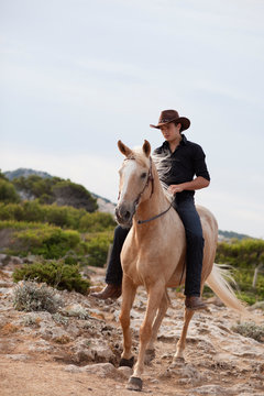 man riding horse