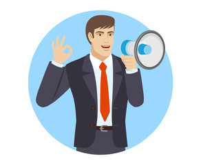 Businessman with loudspeaker showing a okay hand sign