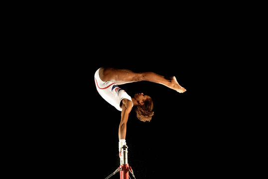 gymnast on high bars