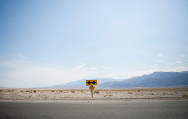 Left or right turn sign at end of road