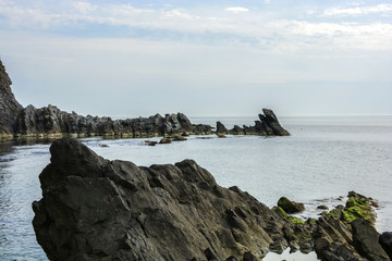 Fototapeta na wymiar The rocks near the shore of the black sea