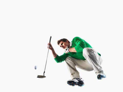 Man playing golf