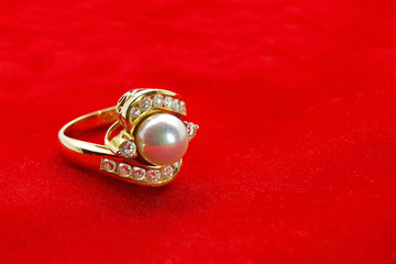 Gold Diamond Pearl Ring on Red Velvet