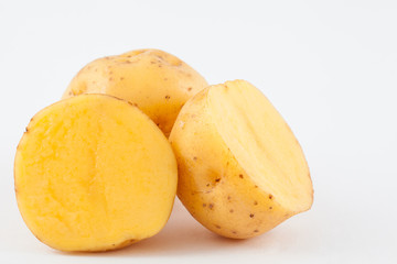 Naklejka na ściany i meble Yellow potato (Solanum phureja) isolated in white background
