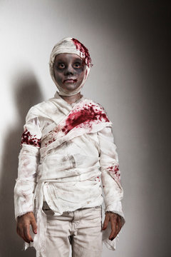 Child dressed as mummy for Halloween
