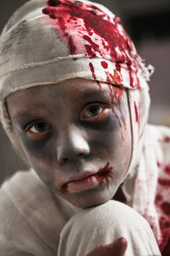 Child dressed as mummy for Halloween