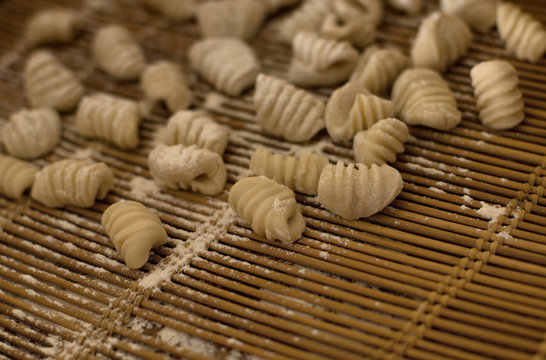 Close up of rolled gnocchi dough