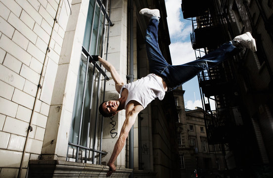 Young man breakdancing