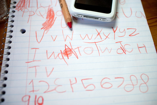 Child's writing on notepad