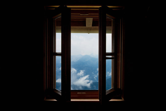 View through open window to mountain scenery, Lenggries, Bavaria