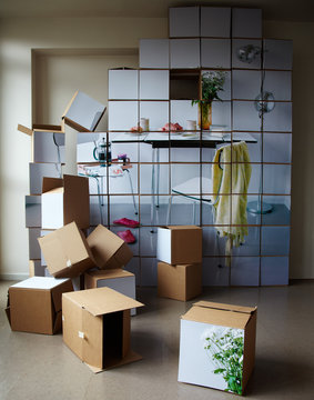 Stack of cardboard boxes with pictures on them