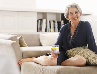 Senior woman in relaxing in robe, portrait