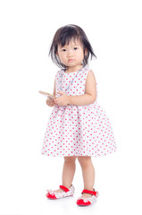 Little asian girl using smart phone isolated over white