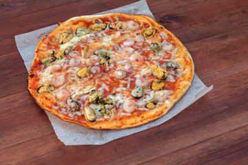 pizza on wood background