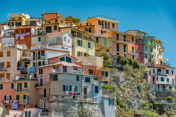 Fototapeta na wymiar View of the colorful city of Manarola in the Gulf of Five Lands in Italy