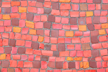 Fototapeta premium Beautiful background of multi-colored tiles. Tiled mosaic in pastel colors.Red, pink, yellow