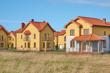 Fototapeta na wymiar Suburbia Houses New Development Suburban Homes in Europe.
