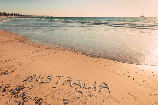 Australia text on beach
