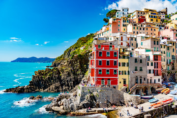 View of the colorful city of Riomaggiore in the gulf of the five lands in Italy