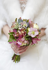 Bride holding wedding bouquet 