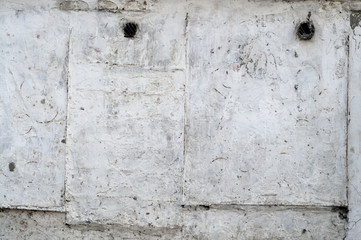 White wall with cracks