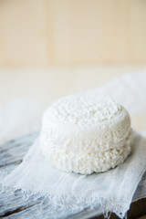 Cottage cheese with Mandarin in the plate. Dessert for Breakfast. Black wooden background