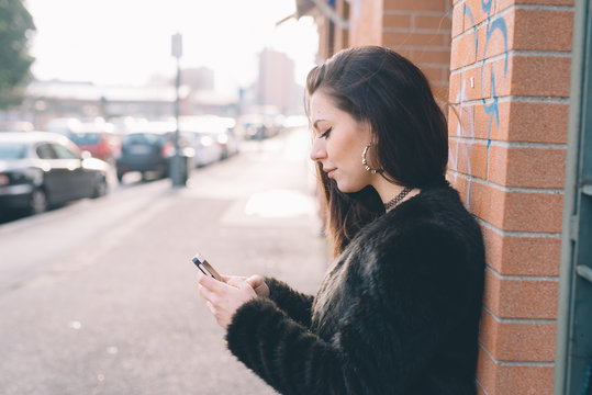 young beautiful woman using smartphone