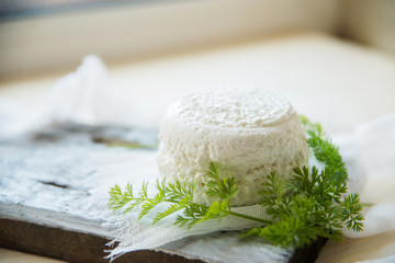 Homemade Crispbread toast with Cottage Cheese and parsley on white wooden board background.