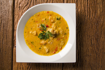 shrimp bobo - a Brazilian dish of shrimp in a pure of manioc meal and coconut milk. Bobo de camarao.
