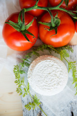 mozzarella, cherry tomatoes and fresh basil - ingredients for caprese salad