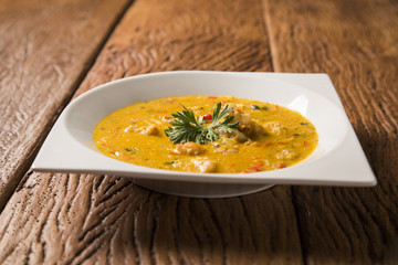 shrimp bobo - a Brazilian dish of shrimp in a pure of manioc meal and coconut milk. Bobo de camarao.